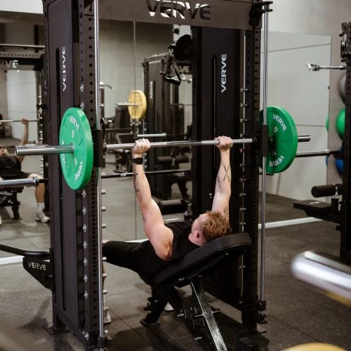 Man bench pressing weights